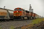 BNSF 4588 leads this junk freight Nb in the rain.